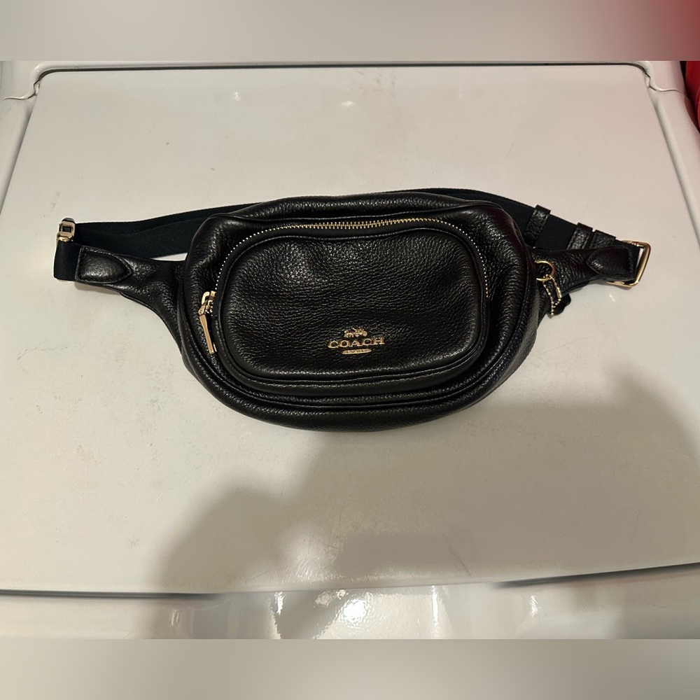 Coach Bumbag in black pebbled leather and gold hardware.